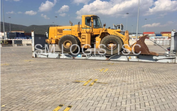 Loading and Secure Front end loader on container Fr