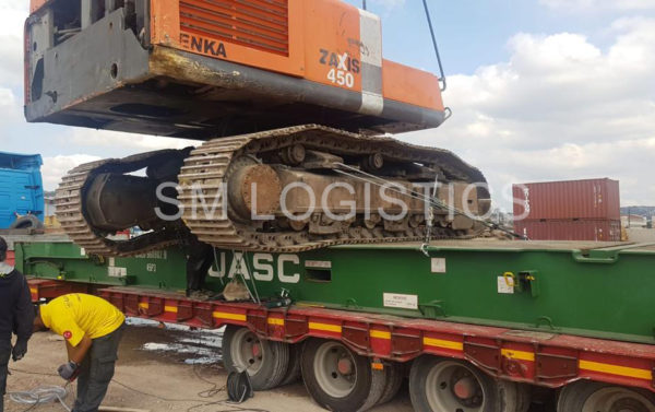Loading and secure Zx450 on container Flat Rack